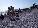 young couple on the nude beach