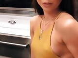 Sarah Hyland with pokie nipples in short yellow dress