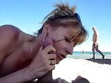 MILF Gives Blowjob at Beach in Public