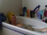 mom masturbates in bath