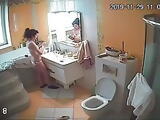 Wife washes in the toilet